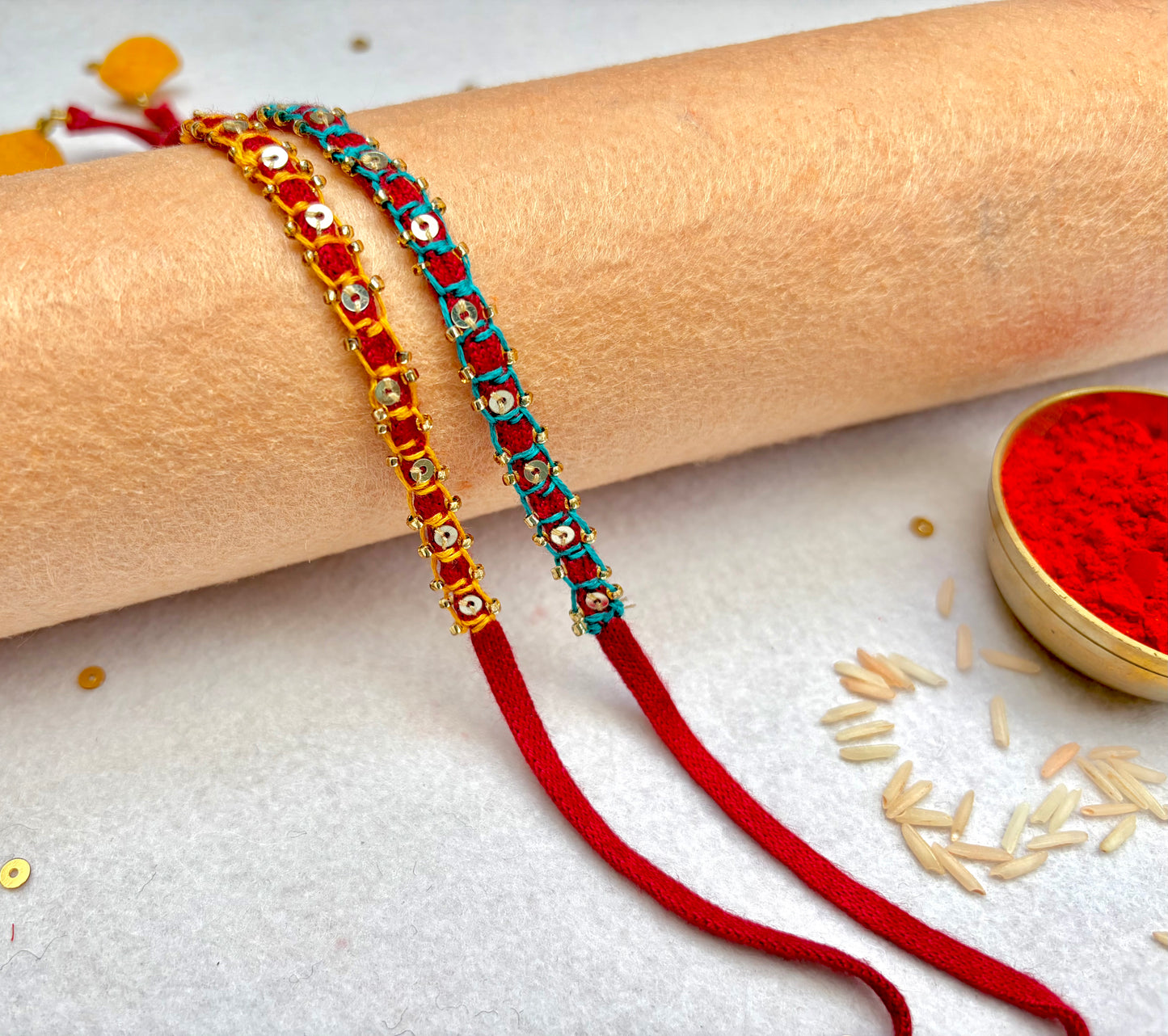 Hand embroidered Blanket Sequin Rakhi (Set of 2)- Turquoise-Yellow