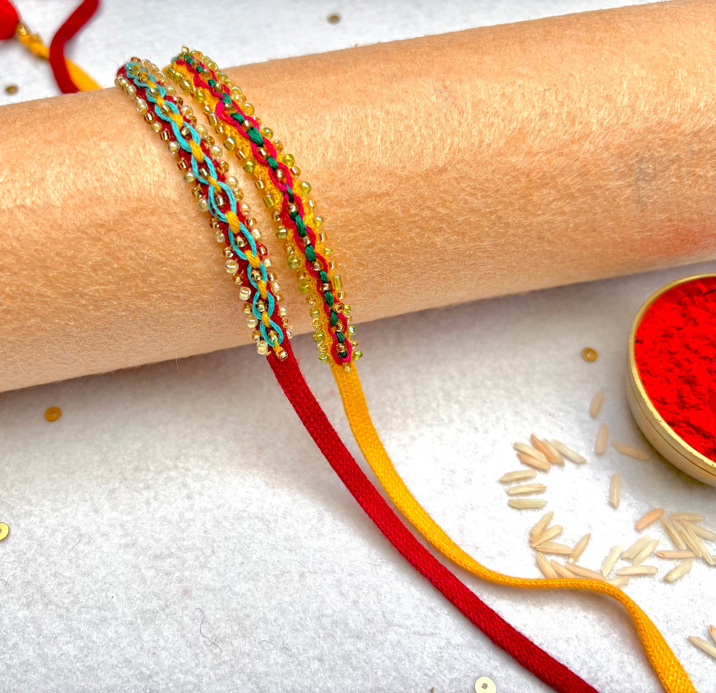 Hand embroidered Double Leheriya Rakhi (Set of 2)- Blue-Pink