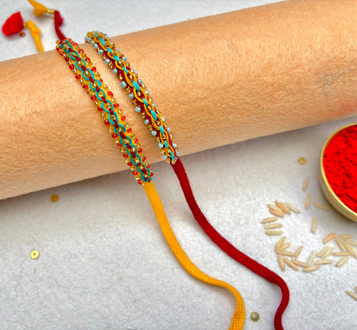 Hand embroidered Double Leheriya Rakhi (Set of 2)- Yellow-Blue