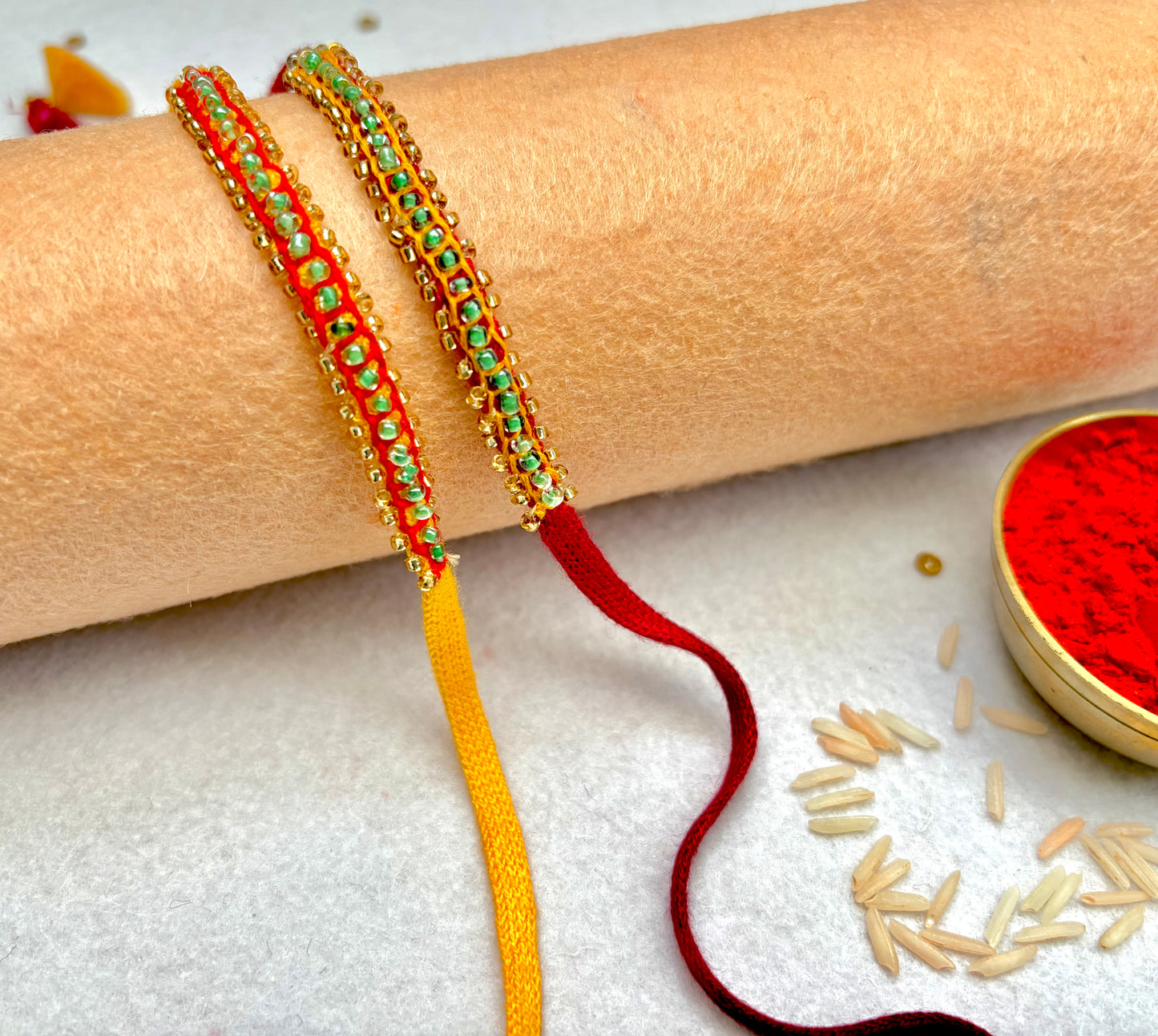 Hand embroidered Beaded Chain Rakhi (Set of 2)- Yellow-Red