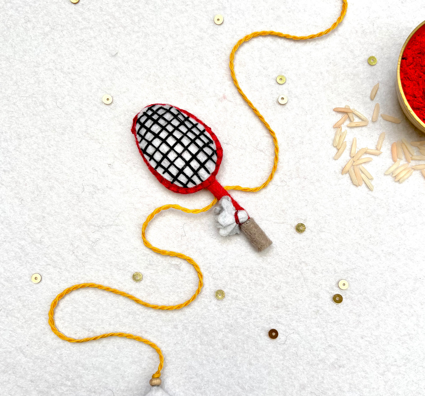 Hand embroidered Badminton Rakhi-Red