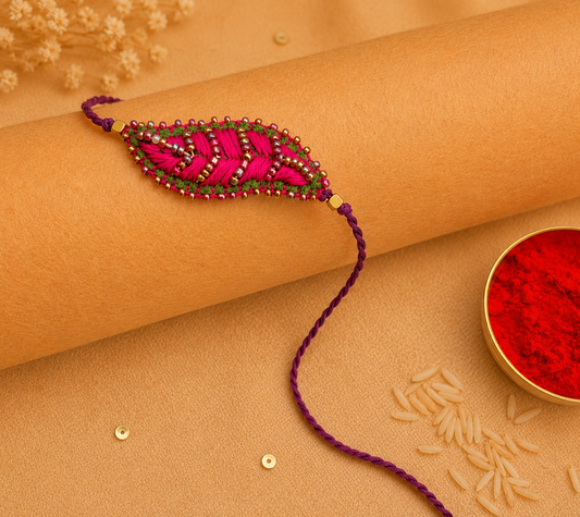 Hand embroidered Leaf Ornamental Rakhi (Pink)